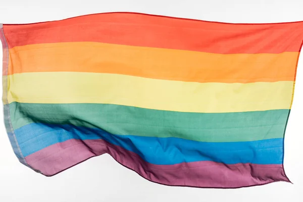 Agitant lgbt drapeau arc-en-ciel isolé sur blanc, — Photo de stock