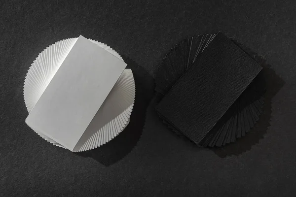 Top view of empty cards on black table with copy space — Stock Photo