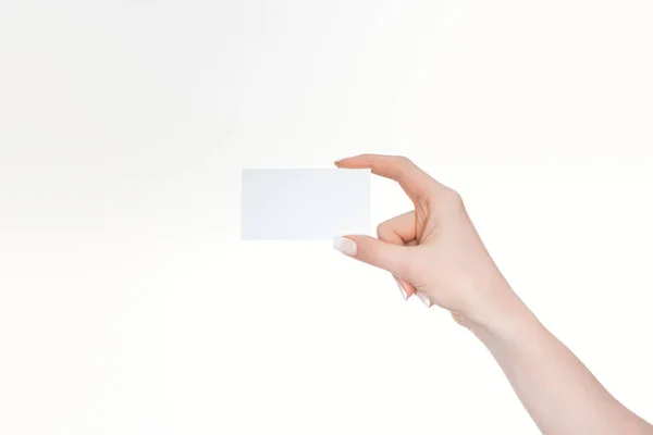 Cropped view of woman holding empty card isolated on white — Stock Photo