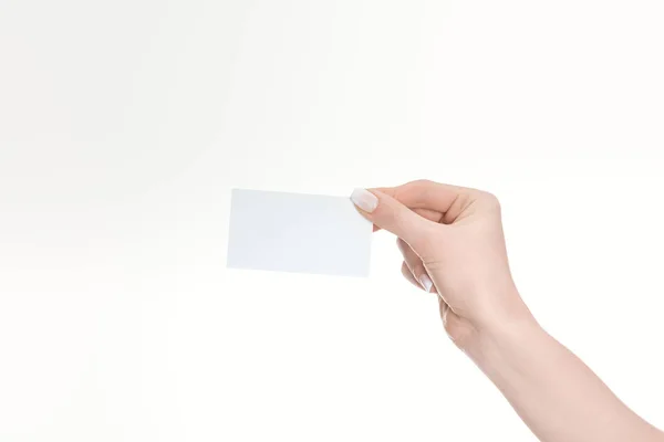 Partial view of woman holding empty card isolated on white — Stock Photo