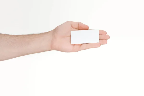 Cropped view of man holding blank card on white background — Stock Photo