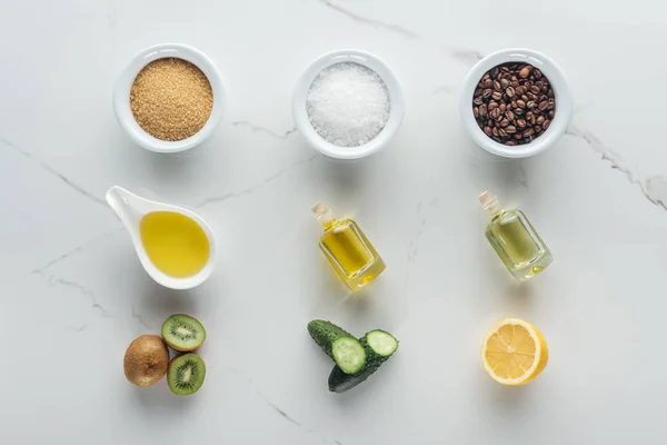 Top view of different components for homemade cosmetics on white surface — Stock Photo