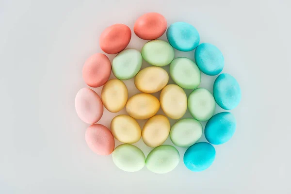 Top view of pastel easter eggs isolated on grey — Stock Photo