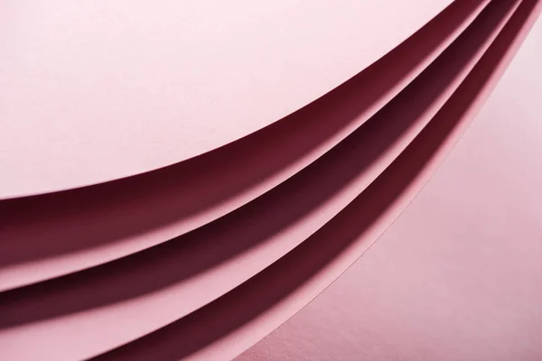 Empty and colorful sheets of paper on pink background with copy space — Stock Photo