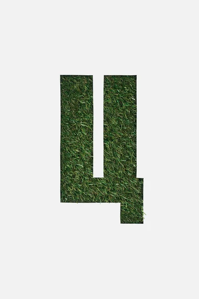 Top view of cyrillic letter with green grass on background isolated on white — Stock Photo