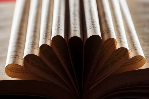Selective focus of old book with folded pages — Stock Photo