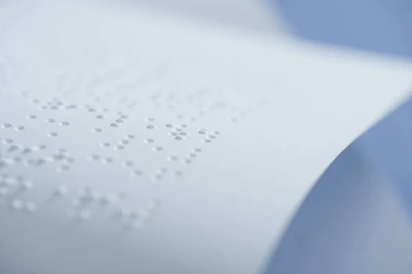 Selective focus of braille text on white paper with copy space — Stock Photo