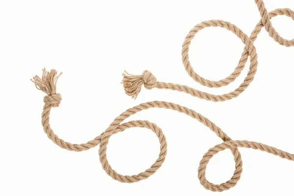 Джут скрученные веревки с узлами, изолированными на белом — стоковое фото