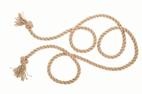 Коричневая джутовая веревка с кудрями и узлами, изолированными на белом — стоковое фото