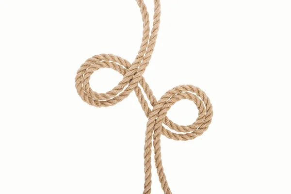 Закручені коричневі та джутові мотузки ізольовані на білому — стокове фото