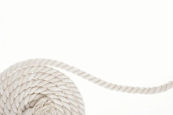 White, long and twisted rope isolated on white — Stock Photo