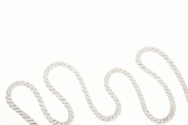 White waved and long rope isolated on white — Stock Photo