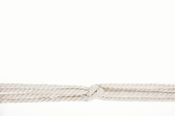 Nautical white ropes with sailor knot isolated on white — Stock Photo