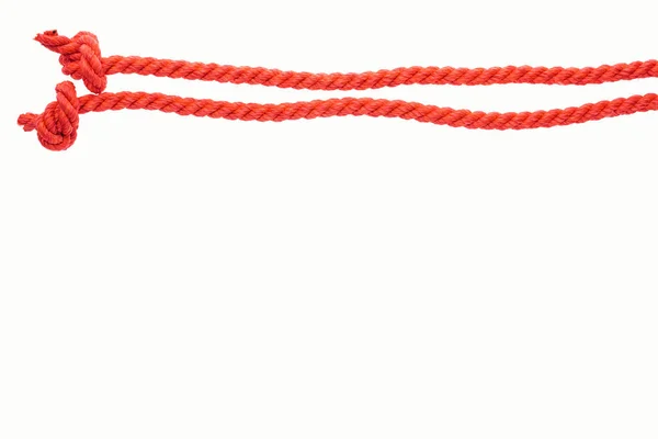 Red long lines with ropes isolated on white — Stock Photo