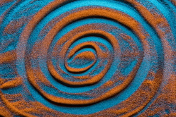 Вид зверху хвилястий фон з піском і кольоровим фільтром — стокове фото