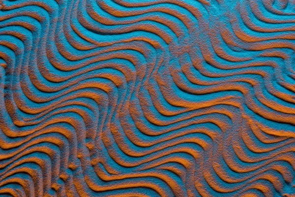 Top view of sandy background with color filter and abstract waves — Stock Photo