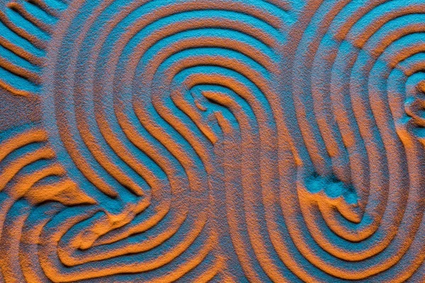 Top view of sandy background with color filter and abstract waves — Stock Photo