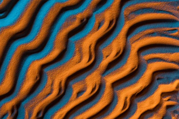 Vue du dessus de fond sablonneux abstrait avec filtre de couleur — Photo de stock