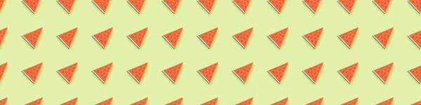 Panoramic shot of textured pattern with handmade paper watermelon slices isolated on green — Stock Photo