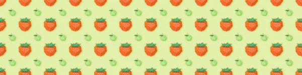 Panoramic shot of pattern with handmade paper strawberries and apples isolated on green — Stock Photo