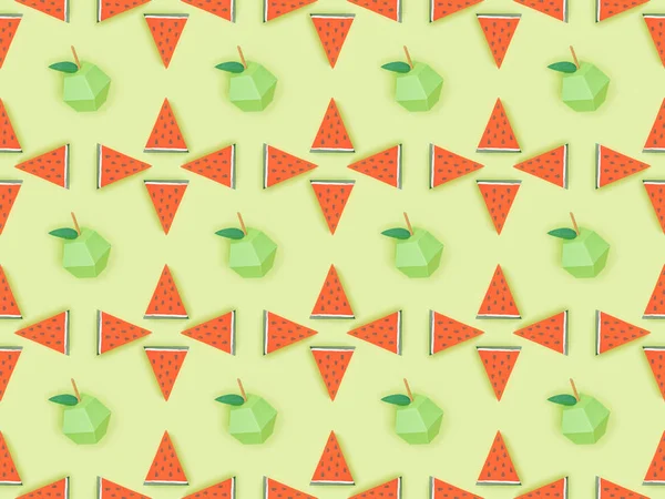 Вид зверху візерунка з картонними яблуками та шматочками кавуна ізольовані на зеленому — стокове фото