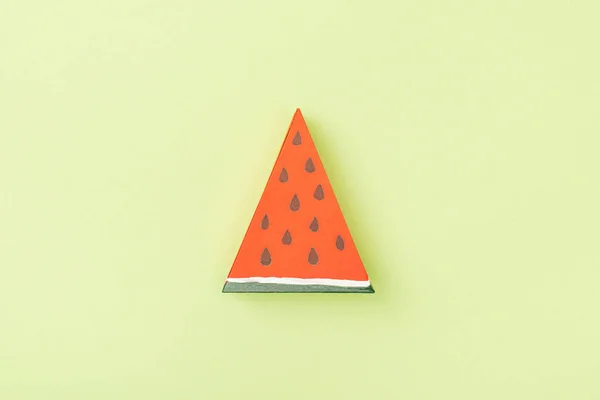 Top view of handmade paper watermelon isolated on green — Stock Photo
