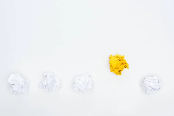 Top view of crumpled paper balls Isolated On White with copy space, solution concept — Stock Photo