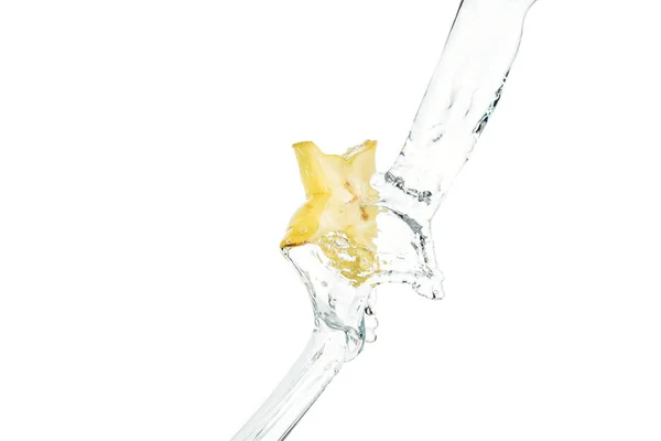 Fresh exotic star fruit slice and flowing water isolated on white — Stock Photo