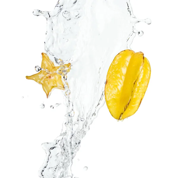 Whole ripe exotic star fruit and slice with water splash and drops isolated on white — Stock Photo