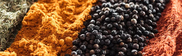 Close up view of traditional colorful indian spices, panoramic shot — Stock Photo