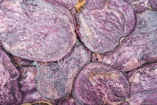 Top view of cut fresh purple radish slices in stack — Stock Photo