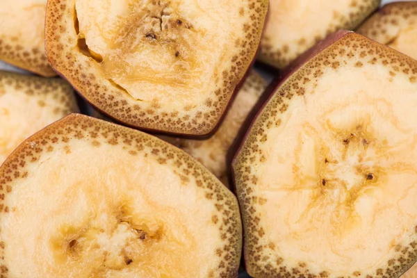 Top view of ripe delicious banana slices in pile — Stock Photo