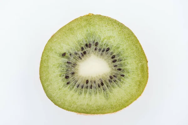 Close up view of cut fresh nutritious green kiwi with seeds isolated on white — Stock Photo