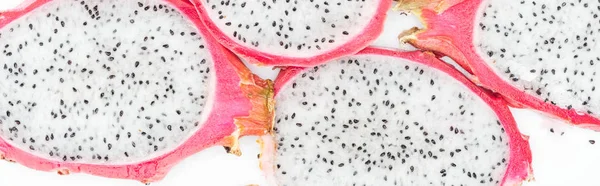 Panoramic shot of tropical ripe dragon fruit slices — Stock Photo