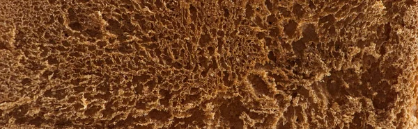 Plano panorámico de pan de textura horneado fresco marrón - foto de stock