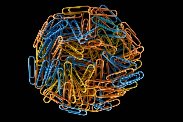 Top view of yellow, blue and orange paper clips in circle isolated on black — Stock Photo