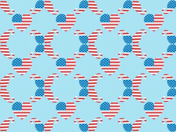 Seamless background pattern with paper cut decorative mustache and hearts made of american national flags on blue — Stock Photo