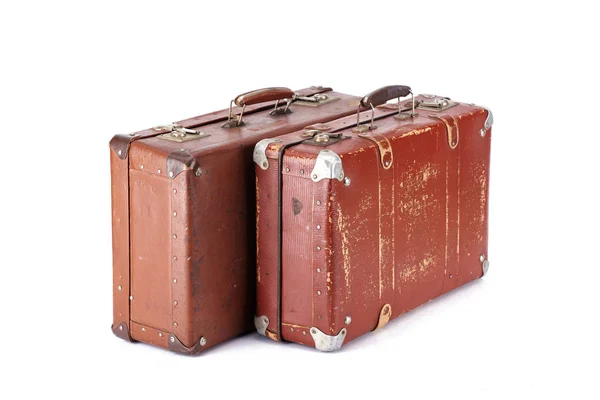 Two leather brown aged vintage suitcases isolated on white — Stock Photo