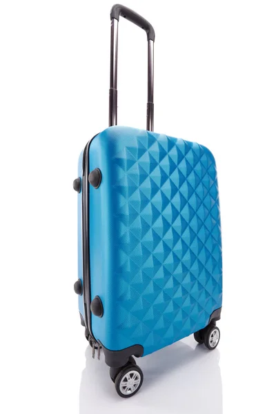 Blue textured wheeled colorful travel bag with handle isolated on white — Stock Photo