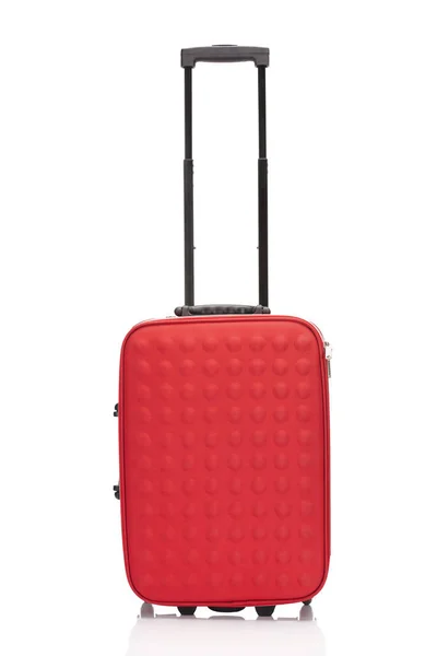 Red colorful suitcase with handle on wheels isolated on white — Stock Photo