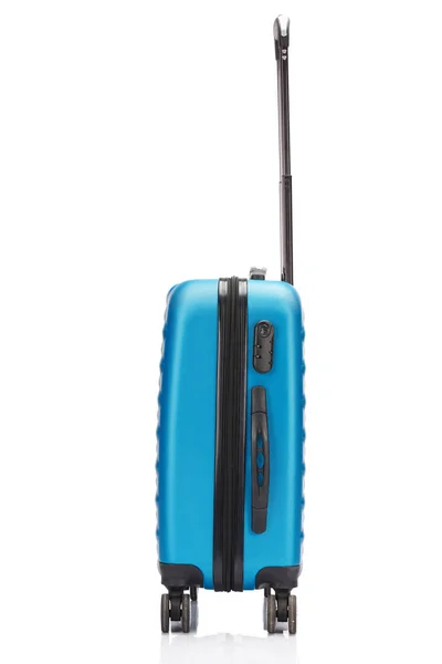 Side view of blue wheeled colorful suitcase with handle isolated on white — Stock Photo