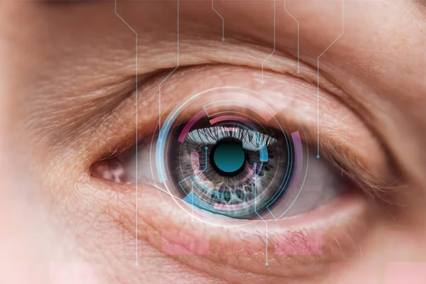 Close up view of human eye with data illustration, robotic concept — Stock Photo