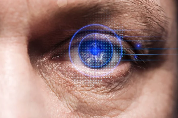 Close up view of human eye with data illustration, robotic concept — Stock Photo