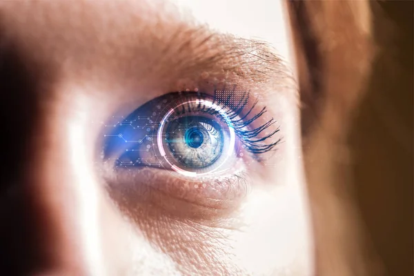 Close up view of human eye with data illustration, robotic concept — Stock Photo