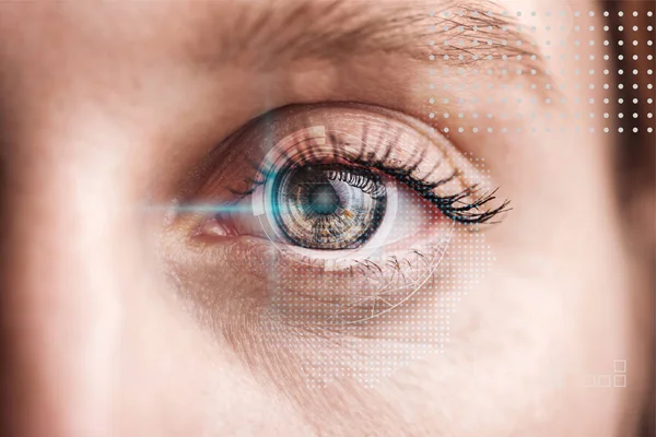 Close up view of human eye with data illustration, robotic concept — Stock Photo