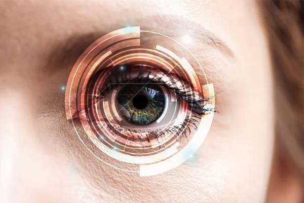 Close up view of human eye with data illustration, robotic concept — Stock Photo