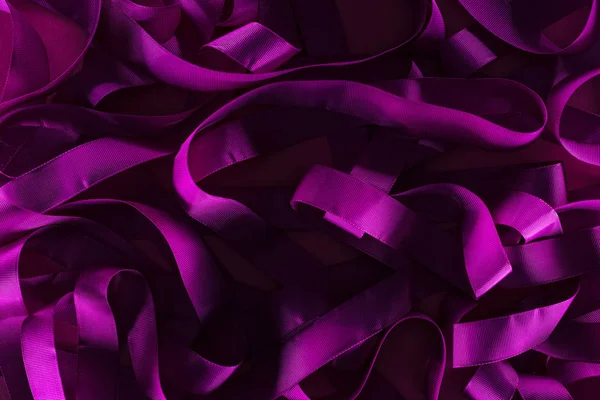 Messy purple stips in shadow on purple background — Stock Photo