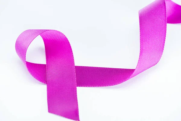 Close up view of purple ribbon on white background — Stock Photo