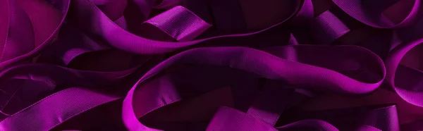 Panoramic shot of messy purple stips in shadow on purple background — Stock Photo