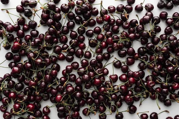 Top view of red and ripe cherries on white background — Stock Photo